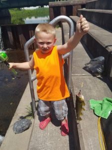 Zyla's son, Xander, 6, shows off the fish he caught. (provided by Alan Zyla)