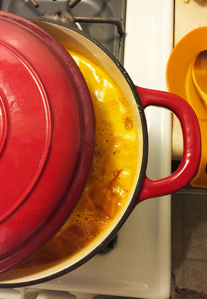 A delicious stew made with turmeric simmering on the stove.